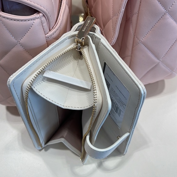 Kate Spade Carey Medium Compartment Bifold Wallet 
COLOR: Parchment - Picture 11 of 16